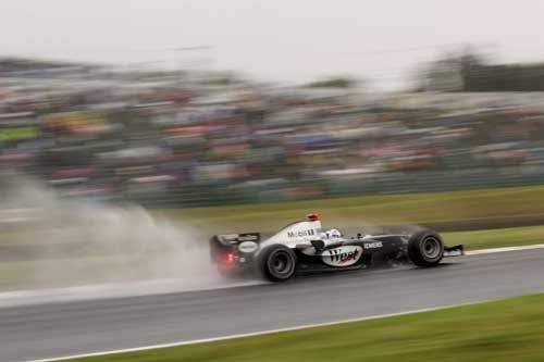 David Coulthard during practice for the 2004 Japanese Grand Prix Poster