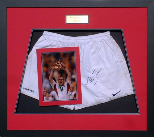 Johnson signed match worn shorts presentation