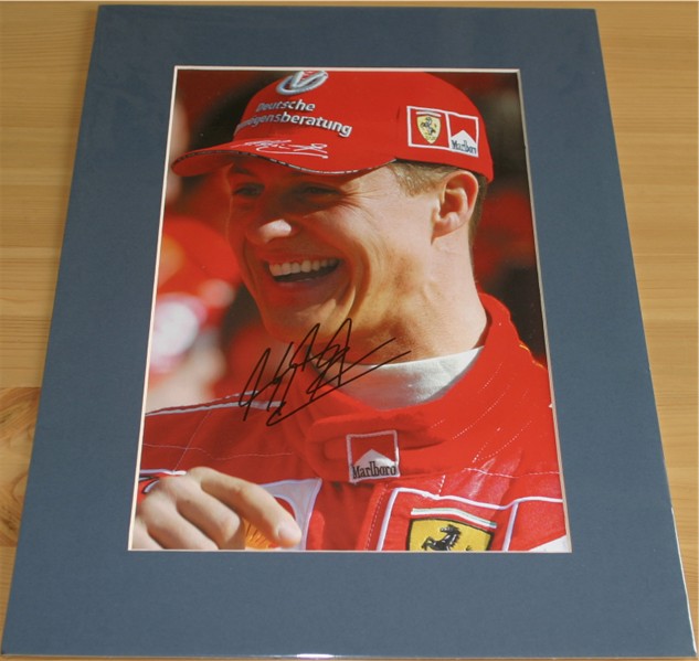 MICHAEL SCHUMACHER HAND SIGNED CALENDAR PAGE -