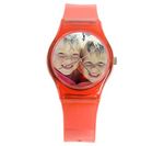 Watch with transparent red strap