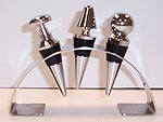 Royal Doulton 3 Wine Stoppers and a Bar Stand