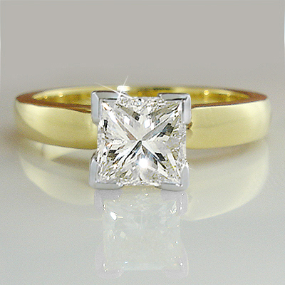 Sharp  clean cuts make the princess cut diamond a contemporary favorite.A fiery ONE Carat Princess