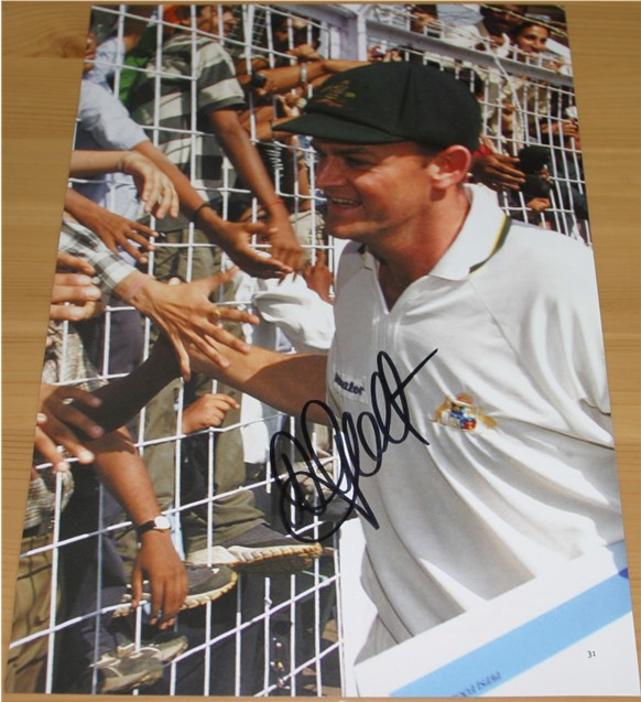 ADAM GILCHRIST SIGNED 12 x 8 INCH MAGAZINE PAGE