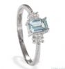 Diamond and blue topaz ring