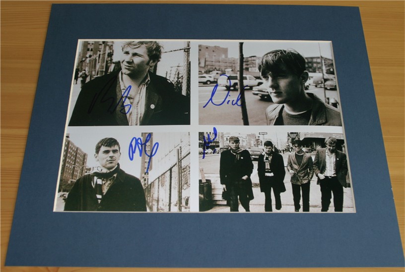 Quality photograph signed in blue pen by Alex  Nick  Paul and Bob from the successfull British band