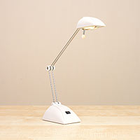 Versatile lamp providing a multi positional light