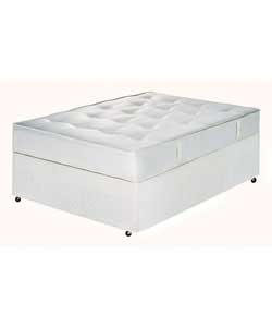 Upholstered platform top divan with castors. With this spring system, rows of springs are linked