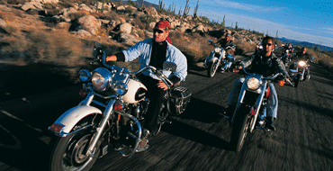 Unbranded Off Peak Harley-Davidson Driving on the Open Road