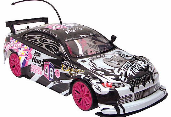 Features 1. Pneumatic drifting tires 2. Full directional control handset 3. Front suspension 4. Authentic graphics 5. 1:10 scale The Radio Controlled Racing Drift Car is designed for the serious RC fan. At 1:10 scale, this stunning vehicle looks just