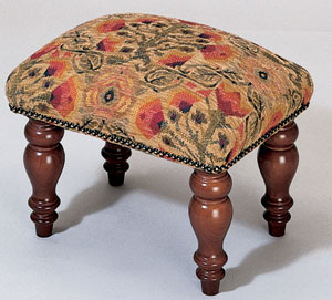 A luxurious fabric stool from the Stuart Jones col