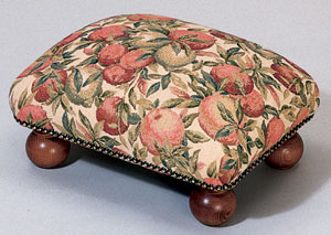 A luxurious fabric stool from the Stuart Jones col