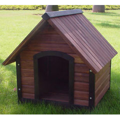 Made from solid fir, this dark-stained wooden kennel is built to withstand the elements, and is also