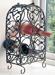 This beautiful hand crafted  wrought iron wine rack has a unique and distinctive quality and style